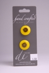 Yellow Circle Button with Black Flower Design